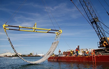 Insitu cap and Sand Cover Armament, sand cover armament, insitu cap armament, rock placement, underwater revetment mat, environmental remediation, precast concrete articulating block mat